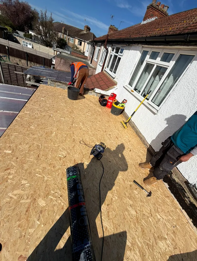 A new timber deck with the first roll of felt ready to go down