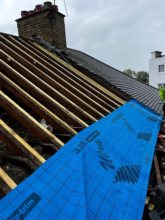 Breathable roofing membrane and new battens going onto a roof